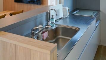 Fridge, microwave, stovetop, cookware/dishes/utensils