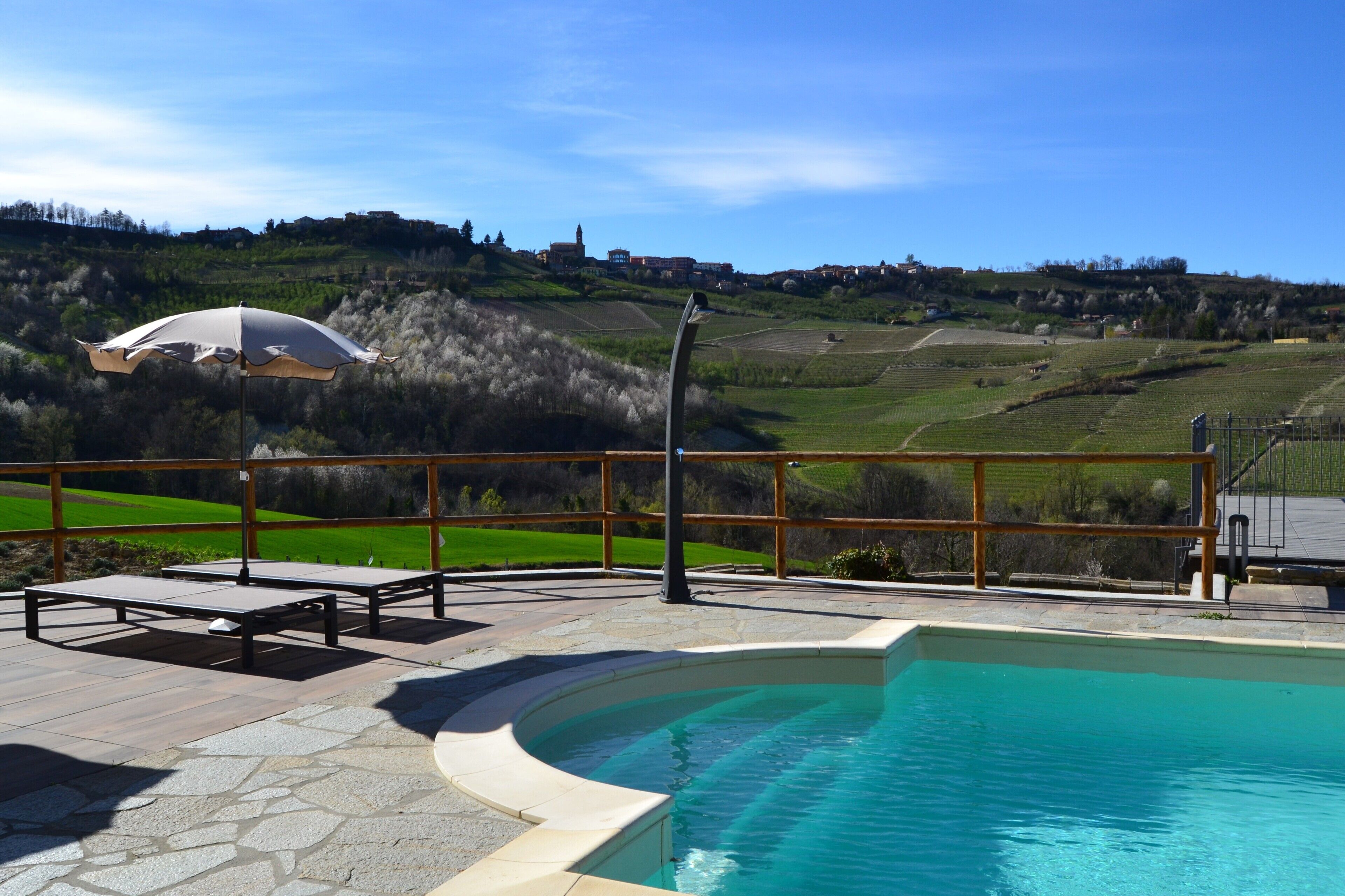 Seasonal outdoor pool, open 9:00 AM to 7:30 PM, pool umbrellas