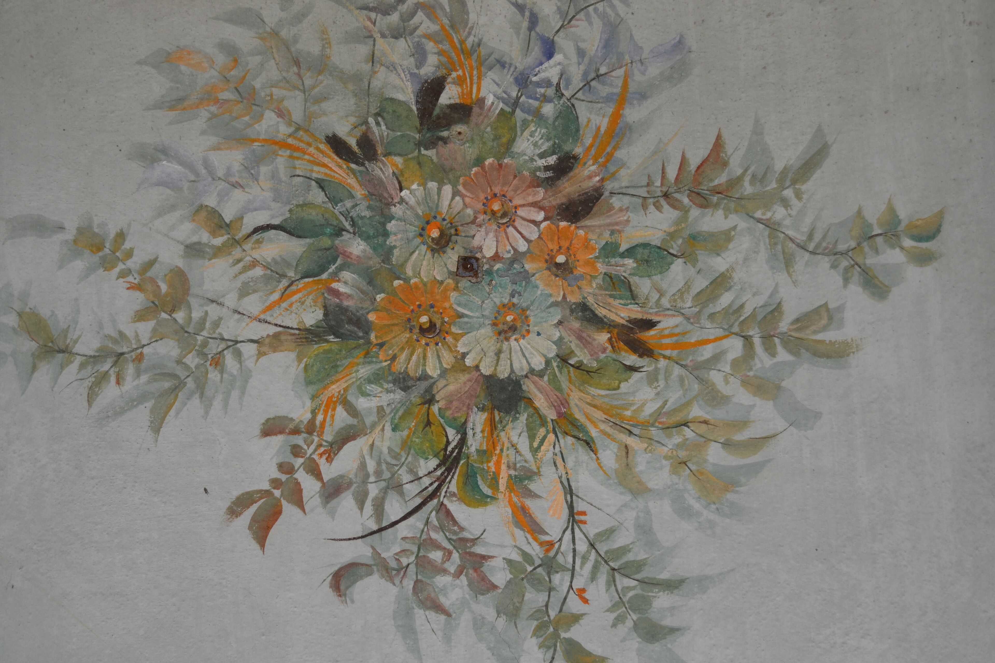 A painting of a floral arrangement with various flowers and leaves.