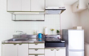 Fridge, microwave, stovetop, cookware/dishes/utensils