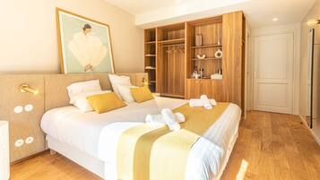Superior Suite | Minibar, individually decorated, iron/ironing board, free WiFi
