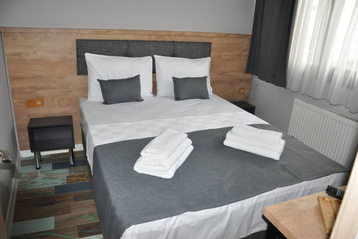 Standard Double Room | Free minibar items, in-room safe, desk, laptop workspace