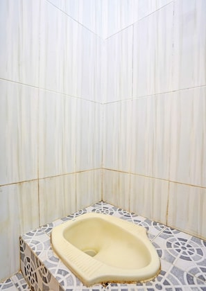 Habitación doble | Baño | Regadera y jabón