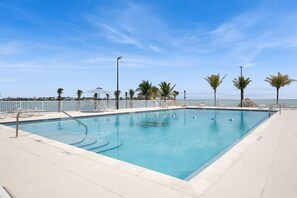Enjoy a refreshing swim in the pool surrounded by a spacious deck.