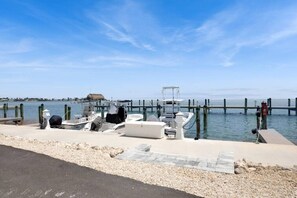 Enjoy serene waterfront views and access to the marina.