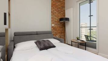Iron/ironing board, travel crib, WiFi, bed sheets