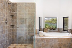 Combined shower/bathtub, towels, soap, shampoo