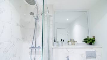 Shower, towels, soap, shampoo