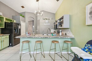 Fridge, microwave, dishwasher, dining tables - 5BR Pool Home Near Disney (Kissimmee)