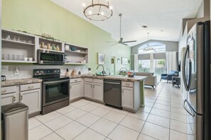 Fridge, microwave, dishwasher, dining tables