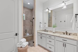 Bathtub, hair dryer, shampoo