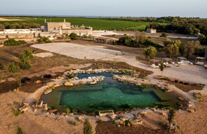 Seasonal outdoor pool, pool loungers