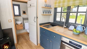 Fridge, electric kettle, toaster, cookware/dishes/utensils