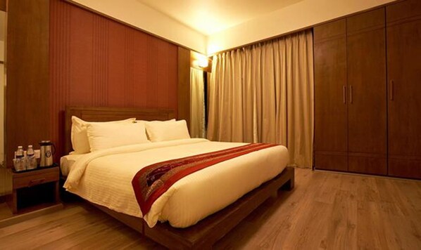 Chambre exécutive | 1 chambre, draps en coton égyptien, literie de qualité, coffre-fort