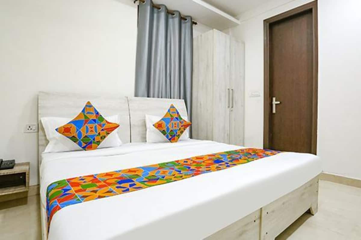 Habitación Deluxe | Ropa de cama de alta calidad y caja de seguridad en la habitación