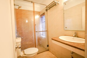 Shower, designer toiletries, towels