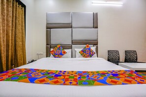 Premium bedding, in-room safe, desk, free WiFi - Fabhotel Tanishq (Sinnar)