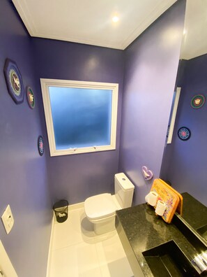 Shower, rainfall showerhead, towels, toilet paper