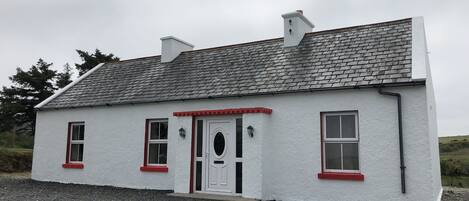 Cottage | Façade de l’hébergement