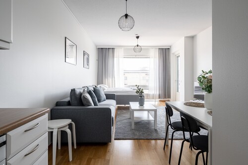 Top Floor 1BR Home with Parking, Sauna and Balcony