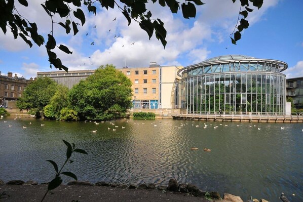 Enjoy unobstructed views of the surrounding greenery from the glass conservatory.