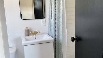 Hair dryer, towels, soap, shampoo