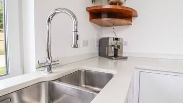 Fridge, dishwasher, electric kettle, cookware/dishes/utensils