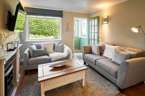 Flatscreentelevisie, streamingdiensten en een kantoor