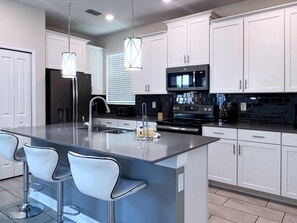 Private kitchen - 5 Bed 5 Bath South Facing Pool Home Storey Lake 5 Bedroom Home by RedAwning (Kissimmee)