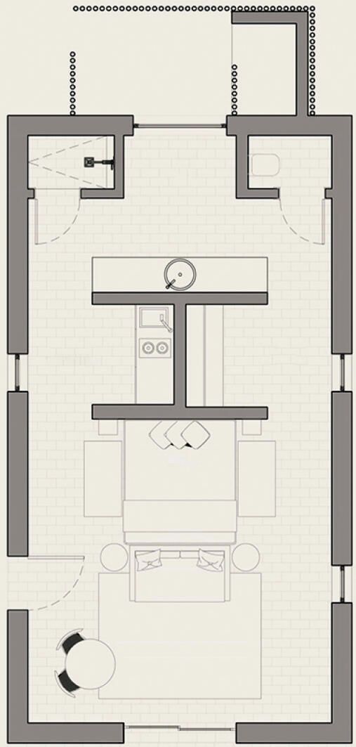 Plano de una habitación de hotel con kitchenette, comedor y zona de estar.