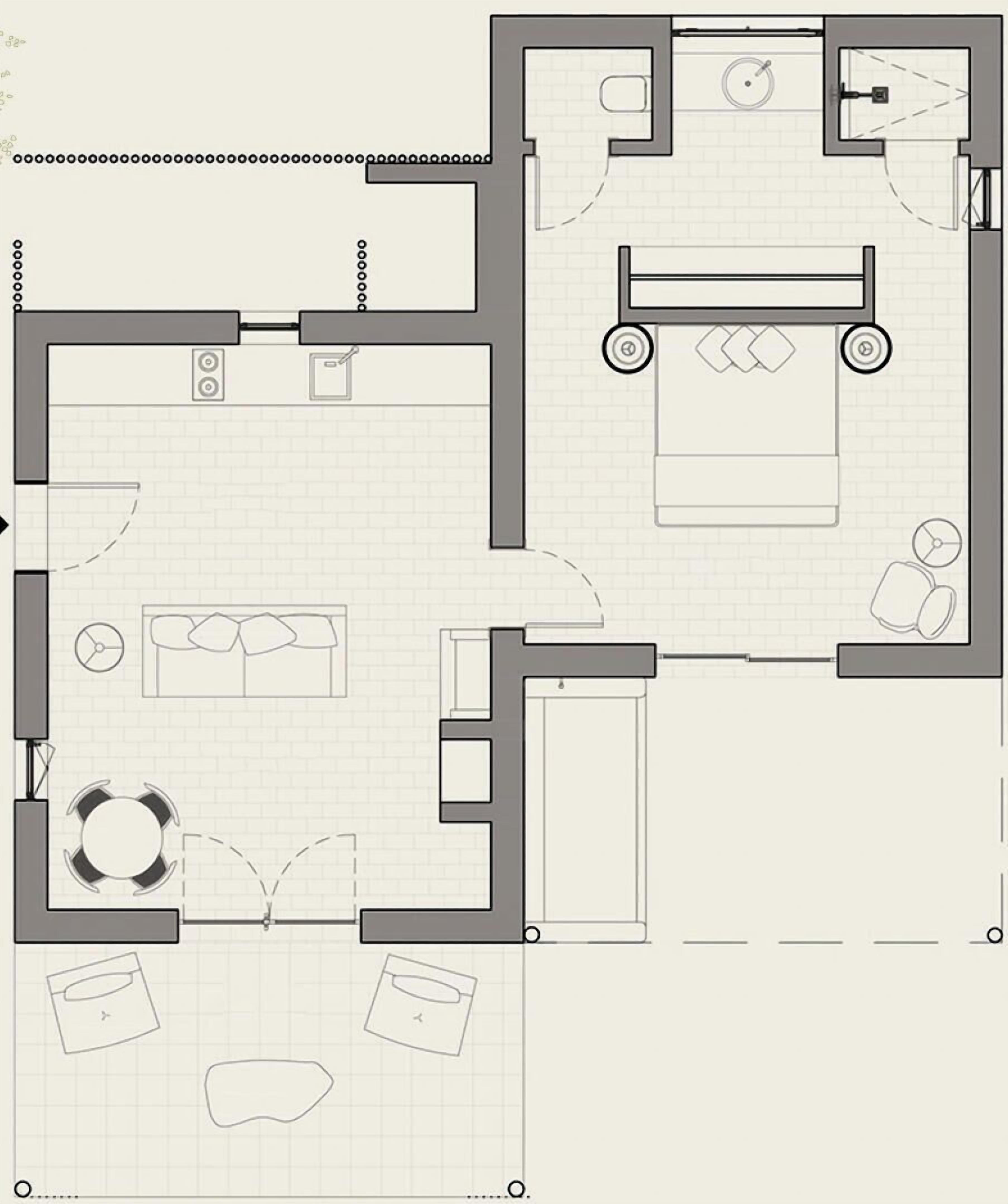 Un plano de planta que muestra una cocina, comedor, sala de estar y dos dormitorios.