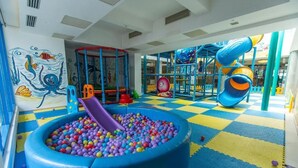 A children's play area with a ball pit, slides, and climbing structures. - HOTEL RIVIERA (Constanta)