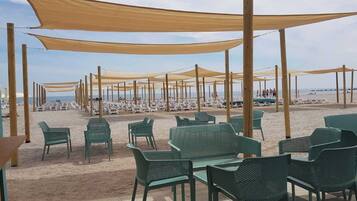 Private beach, beach umbrellas