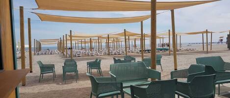 Private beach, beach umbrellas