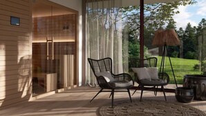 A modern interior with a large glass door leading to a balcony, two black wicker chairs with cushions, a woven rug, and a floor lamp.