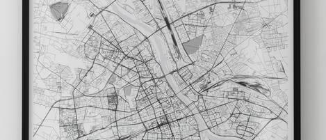 Mapa enmarcado de Varsovia que destaca calles y puntos de referencia.
