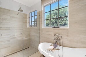 Bathtub, hair dryer, towels