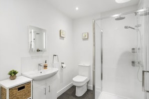 Bathtub, hair dryer, towels