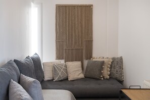 Apartment | Living area | 40-inch flat-screen TV with cable channels, TV - Vagia Calm House 2 (Paros)