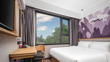 Economy Room | 1 bedroom, premium bedding, down duvets, pillow-top beds