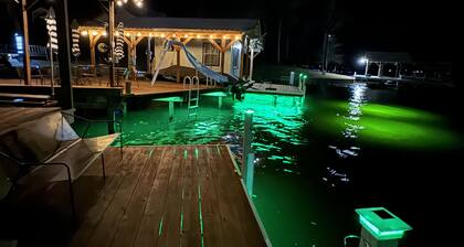Luxury lake escape- golf cart,private beach area,boathouse,fishing lights,kayaks