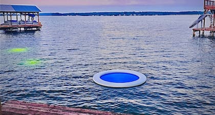 Luxury lake escape with a golf cart,hot tub,private beach area,boathouse,kayaks