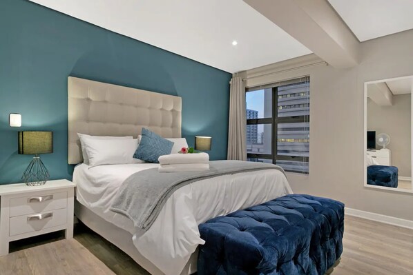 Basic Apartment, 2 Queen Beds | 2 bedrooms, laptop workspace, iron/ironing board, bed sheets