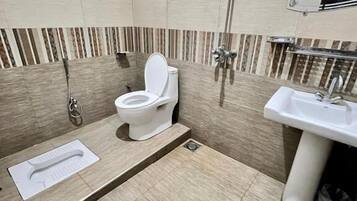 Deluxe Double Room | Bathroom | Shower, designer toiletries, towels, soap