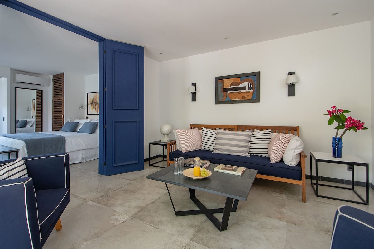 Suite Deluxe | Área de sala de estar