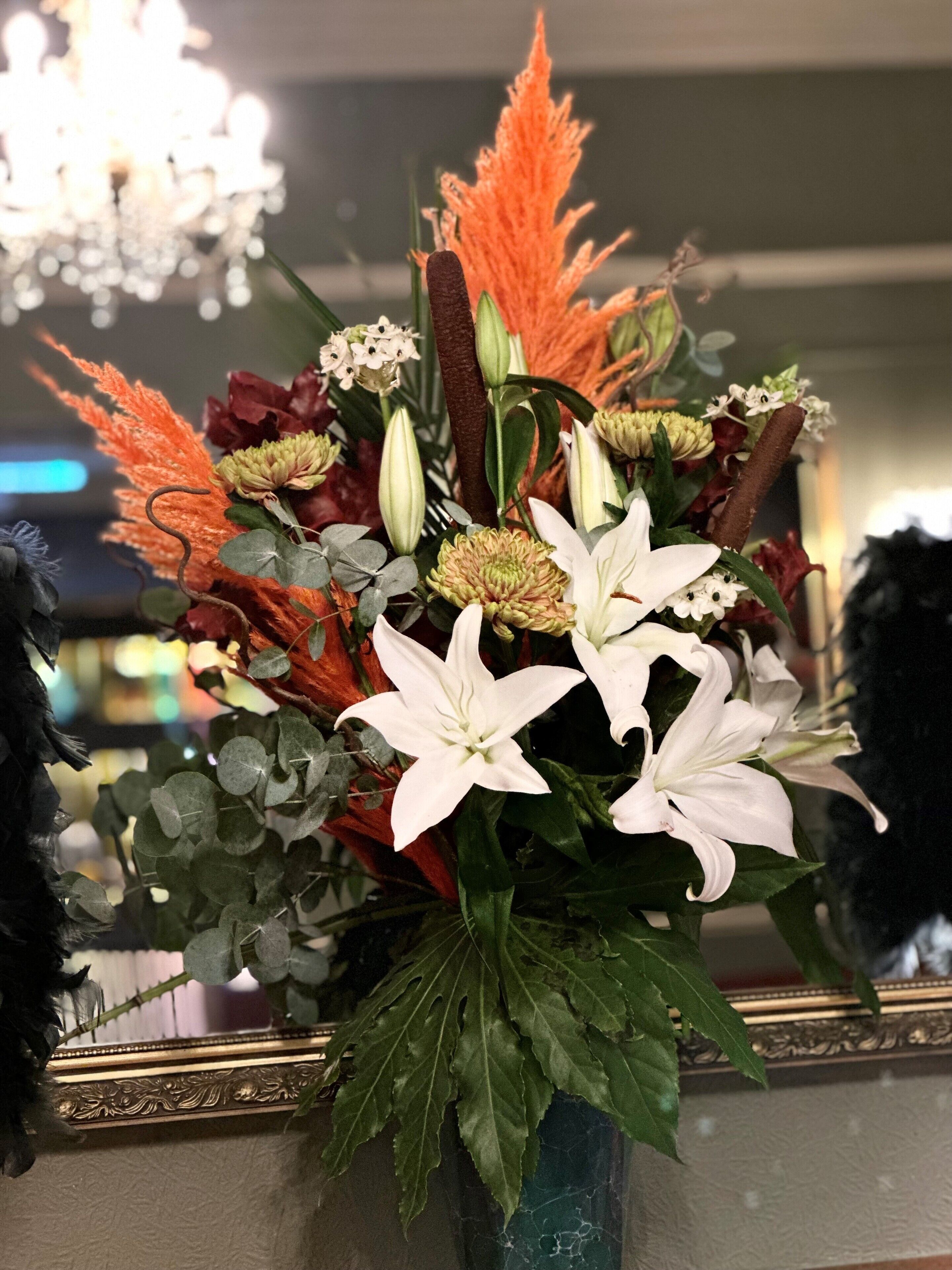A floral arrangement in a vase.