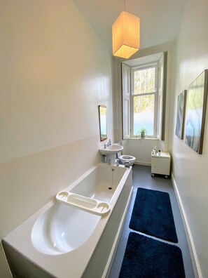 Apartment | Bathroom | Shower, deep soaking tub, hair dryer, towels