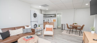 Luxury Centrally-Located 1BR/1BA Basement Apartment with Gym and W/D in Unit