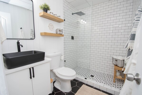 Hair dryer, towels, soap, toilet paper