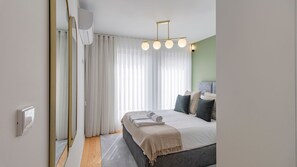 Wake up refreshed in this serene bedroom, bathed in soft morning light, offering a tranquil retreat from the city buzz.
#Bedroom #BrightRoom #LovelyStay - Downtown Bliss w/ AC by LovelyStay (Porto)